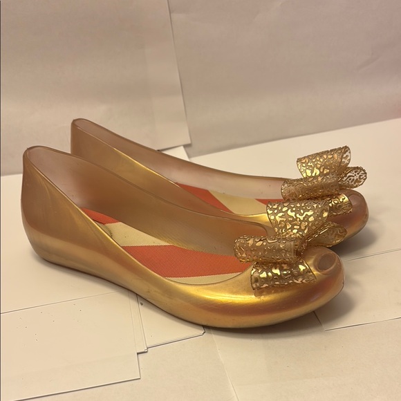 Gold Flats Vivienne Westwood(Melissa)with Bow Detail and Jelly-Like Appearance - Picture 1 of 5